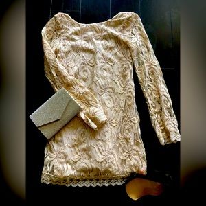 Brand new never worn with tag!  Beautiful fully lined lace mini dress!